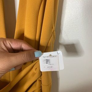 Open back mustard jumpsuit